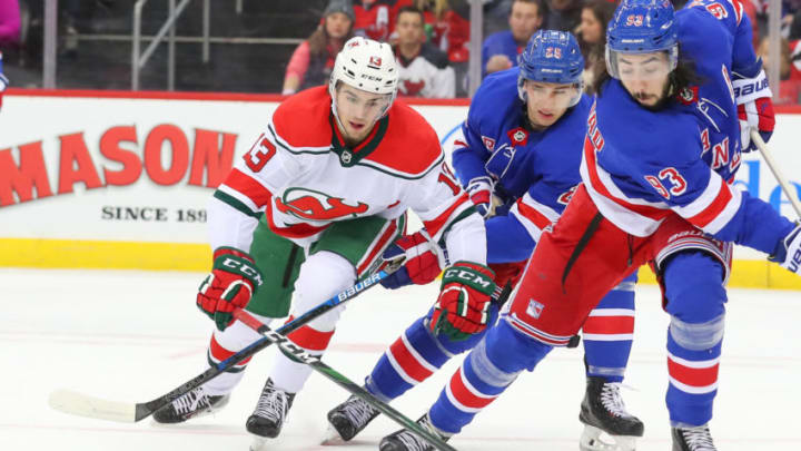 NEWARK, NJ - NOVEMBER 30: New Jersey Devils center Nico Hischier (13) skates during the second period of the National Hockey League game between the New Jersey Devils and the New York Rangers on November 30, 2019 at the Prudential Center in Newark, NJ. (Photo by Rich Graessle/Icon Sportswire via Getty Images)