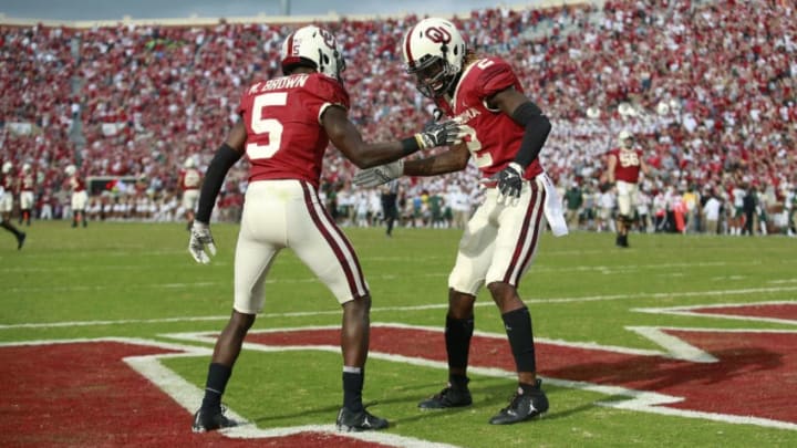 NORMAN, OK - SEPTEMBER 29: Wide receiver CeeDee Lamb #2 and wide receiver Marquise Brown #5 of the Oklahoma Sooners celebrate a touchdown against the Baylor Bears at Gaylord Family Oklahoma Memorial Stadium on September 29, 2018 in Norman, Oklahoma. Oklahoma defeated Baylor 66-33. (Photo by Brett Deering/Getty Images)