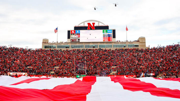 Nov 11, 2023; Lincoln, Nebraska, USA; Three CH-47 Chinook helicopters fly over the field during the national anthem before the game between the Nebraska Cornhuskers and the Maryland Terrapins at Memorial Stadium. Mandatory Credit: Dylan Widger-USA TODAY Sports