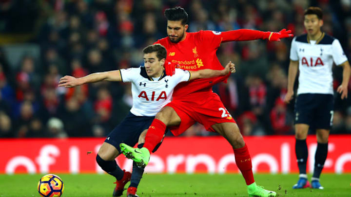 LIVERPOOL, ENGLAND - FEBRUARY 11: Harry Winks of Tottenham Hotspur is challenged by Emre Can of Liverpool during the Premier League match between Liverpool and Tottenham Hotspur at Anfield on February 11, 2017 in Liverpool, England. (Photo by Clive Brunskill/Getty Images)