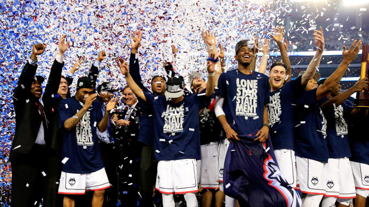 ARLINGTON, TX – APRIL 07: The Connecticut Huskies celebrate after defeating the Kentucky Wildcats 60-54 in the NCAA Men’s Final Four Championship at AT&T Stadium on April 7, 2014 in Arlington, Texas. (Photo by Jamie Squire/Getty Images)