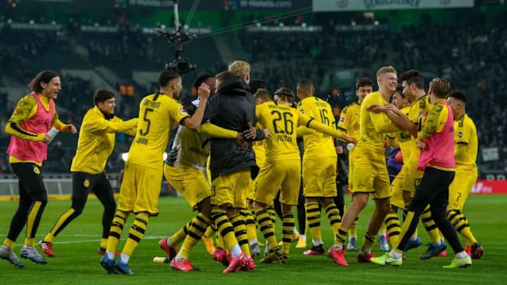 Dortmund's player react after the German first division Bundesliga football match Borussia Moenchengladbach v Borussia Dortmund in Moenchengladbach, western Germany on March 7, 2020. (Photo by SASCHA SCHUERMANN / AFP) / DFL REGULATIONS PROHIBIT ANY USE OF PHOTOGRAPHS AS IMAGE SEQUENCES AND/OR QUASI-VIDEO (Photo by SASCHA SCHUERMANN/AFP via Getty Images)