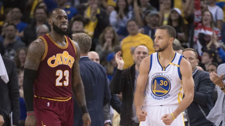 January 16, 2017; Oakland, CA, USA; Golden State Warriors guard Stephen Curry (30) celebrates in front of Cleveland Cavaliers forward LeBron James (23) during the second quarter at Oracle Arena. Mandatory Credit: Kyle Terada-USA TODAY Sports