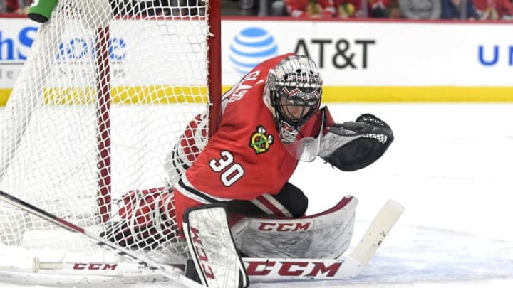 CHICAGO, IL - JANUARY 05: Chicago Blackhawks goaltender Jeff Glass (30) blocks a shot during a game between the Chicago Blackhawks and the Vegas Golden Knights on January 05, 2018, at the United Center in Chicago, IL. (Photo by Robin Alam/Icon Sportswire via Getty Images)