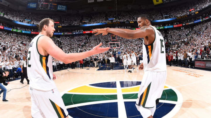 SALT LAKE CITY, UT - APRIL 23: Joe Ingles #2 and Derrick Favors #15 of the Utah Jazz high five each other after the game against the LA Clippers in Game Four during the Western Conference Quarterfinals of the 2017 NBA Playoffs on April 23, 2017 at Vivint Smart Home Arena in Salt Lake City, Utah. NOTE TO USER: User expressly acknowledges and agrees that, by downloading and or using this Photograph, User is consenting to the terms and conditions of the Getty Images License Agreement. Mandatory Copyright Notice: Copyright 2017 NBAE (Photo by Andrew D. Bernstein/NBAE via Getty Images)