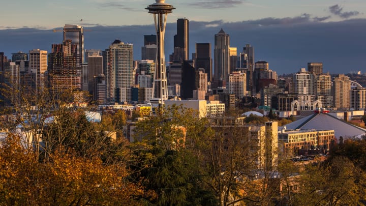 SEATTLE, WA – NOVEMBER 4: The sun sets on the Space Needle and downtown skyline as viewed from Queen Anne Hill on November 4, 2015, in Seattle, Washington. Seattle, located in King County, is the largest city in the Pacific Northwest, and is experiencing an economic boom as a result of its European and Asian global business connections. (Photo by George Rose/Getty Images)
