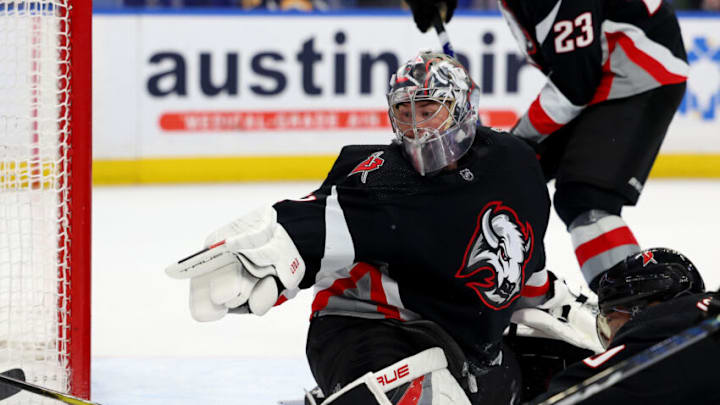 Mar 4, 2023; Buffalo, New York, USA; Buffalo Sabres goaltender Eric Comrie (31) looks for the puck during the third period against the Tampa Bay Lightning at KeyBank Center. Mandatory Credit: Timothy T. Ludwig-USA TODAY Sports