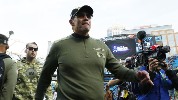 CHARLOTTE, NORTH CAROLINA - NOVEMBER 21: Head coach Ron Rivera of the Washington Football Team walks off the field after a 27-21 win over the Carolina Panthers at Bank of America Stadium on November 21, 2021 in Charlotte, North Carolina. (Photo by Jared C. Tilton/Getty Images)