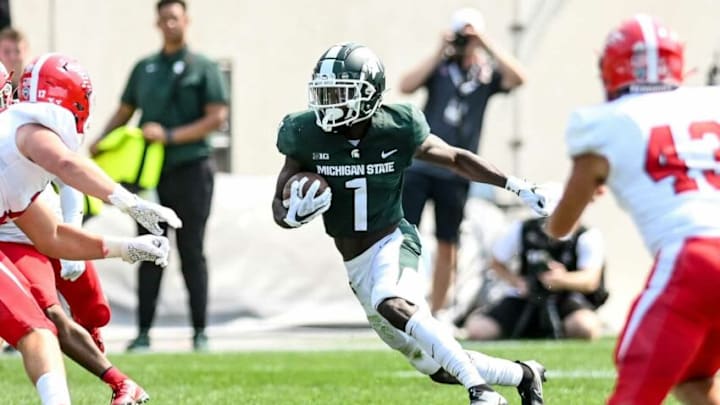 Michigan State's Jayden Reed gains positive yards on a kickoff return against Youngstown State during the third quarter on Saturday, Sept. 11, 2021, at Spartan Stadium in East Lansing.210911 Msu Youngstown Fb 225a