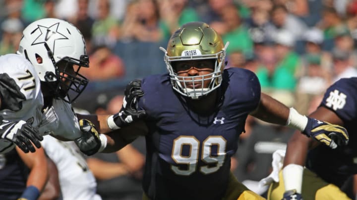 SOUTH BEND, IN - SEPTEMBER 15: Jerry Tillery #99 of the Notre Dame Fighting Irish rushes against Devin Cochran #77 of the Vanderbilt Commodores at Notre Dame Stadium on September 15, 2018 in South Bend, Indiana. Notre Dame defeated Vanderbilt 22-17. (Photo by Jonathan Daniel/Getty Images)