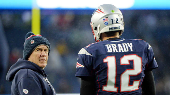 FOXBOROUGH, MASSACHUSETTS - NOVEMBER 24: Head coach Bill Belichick of the New England Patriots talks with Tom Brady #12 before the game against the Dallas Cowboys at Gillette Stadium on November 24, 2019 in Foxborough, Massachusetts. (Photo by Kathryn Riley/Getty Images)