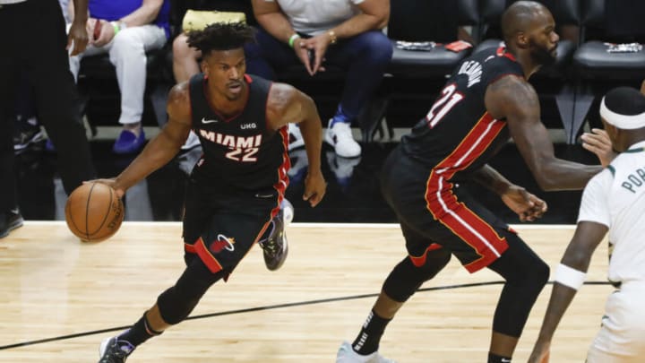 Miami Heat forward Jimmy Butler (22) dribbles the basketball against the Milwaukee Bucks during the first period of game four in the first round of the 2021 NBA Playoffs(Sam Navarro-USA TODAY Sports)