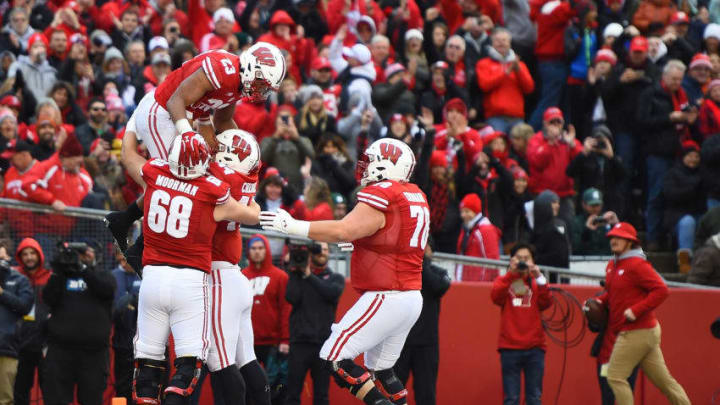 MADISON, WISCONSIN - OCTOBER 12: Jonathan Taylor #23 of the Wisconsin Badgers celebrates a touchdown with teammates during the second half of a game against the Michigan State Spartans at Camp Randall Stadium on October 12, 2019 in Madison, Wisconsin. (Photo by Stacy Revere/Getty Images)