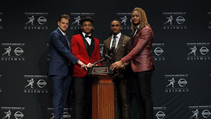 NEW YORK, NY – DECEMBER 14: (L-R) Finalists for the 85th annual Heisman Memorial Trophy, quarterback Joe Burrow of the LSU Tigers, quarterback Justin Fields of the Ohio State Buckeyes, quarterback Jalen Hurts of the Oklahoma Sooners and defensive end Chase Young of the Ohio State Buckeyes pose for a picture on December 14, 2019 in New York City. Three of the four are now 2020 NFL Draft hopefuls. (Photo by Adam Hunger/Getty Images)