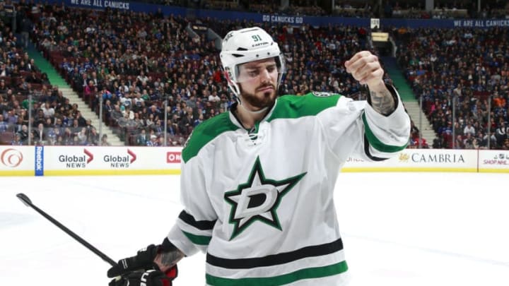 VANCOUVER, BC - DECEMBER 3: Tyler Seguin #91 of the Dallas Stars pulls a three of his jersey during their NHL game against the Vancouver Canucks at Rogers Arena December 3, 2015 in Vancouver, British Columbia, Canada. (Photo by Jeff Vinnick/NHLI via Getty Images)