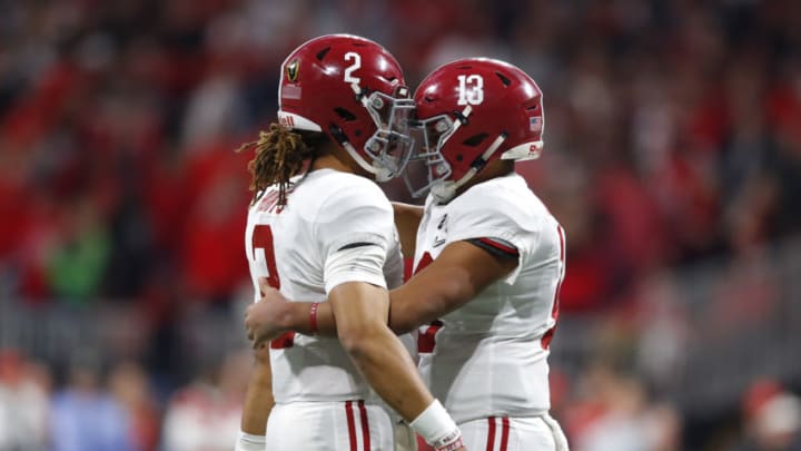 ATLANTA, GA - JANUARY 08: Alabama Crimson Tide quarterback Tua Tagovailoa (13) celebrates a touchdown with fellow teammate quarterback Jalen Hurts (2) during the College Football Playoff National Championship Game between the Alabama Crimson Tide and the Georgia Bulldogs on January 8, 2018 at Mercedes-Benz Stadium in Atlanta, GA. The Alabama Crimson Tide won the game in overtime 26-23. (Photo by Todd Kirkland/Icon Sportswire via Getty Images)