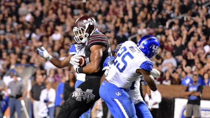 Oct 24, 2015; Starkville, MS, USA; Mississippi State Bulldogs tight end Darrion Hutcherson (84) comes down with a pass in the end zone as he is defended by Kentucky Wildcats safety Darius West (25) during the third quarter of the game against the Kentucky Wildcats at Davis Wade Stadium. Mississippi State won 42-16 Mandatory Credit: Matt Bush-USA TODAY Sports Oct 24, 2015; Starkville, MS, USA; Mississippi State Bulldogs tight end Darrion Hutcherson (84) comes down with a pass in the end zone as he is defended by Kentucky Wildcats safety Darius West (25) during the third quarter of the game against the Kentucky Wildcats at Davis Wade Stadium. Mississippi State won 42-16 Mandatory Credit: Matt Bush-USA TODAY Sports
