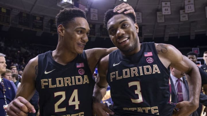 SOUTH BEND, IN - MARCH 04: Devin Vassell #24 and Trent Forrest #3 of the Florida State Seminoles walk off the court after their come from behind win over the Notre Dame Fighting Irish at Purcell Pavilion on March 4, 2020 in South Bend, Indiana. (Photo by Michael Hickey/Getty Images)