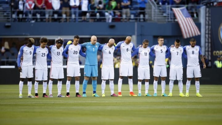 Jun 16, 2016; Seattle, WA, USA; The United States starting eleven observe a moment of silence for the victims of the Orlando shooting before the start of a game against Ecuador during quarter-final play in the 2016 Copa America Centenario soccer tournament at Century Link Field. The United States won 2-1. Mandatory Credit: Jennifer Buchanan-USA TODAY Sports