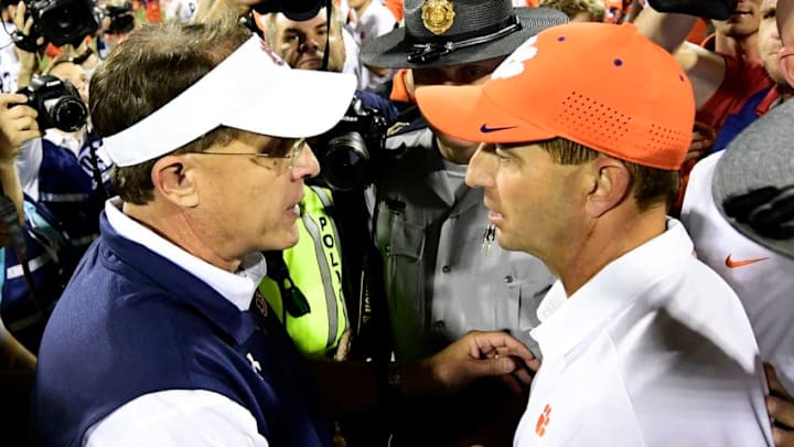 CLEMSON, SC - SEPTEMBER 09: Head coach Dabo Swinney of the Clemson Tigers and head coach Gus Malzahn of the Auburn Tigers shake hands following Clemson's victory over Auburn in the football game at Memorial Stadium on September 9, 2017 in Clemson, South Carolina. (Photo by Mike Comer/Getty Images)