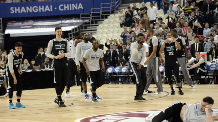 Oct 13, 2015, Shanghai, China; Members of the Charlotte Hornets react to dancing by center Frank Kaminsky (44) during fan appreciation night with the Los Angeles Clippers and the Charlotte Hornets at the Shanghai Oriental Sports Center. Mandatory Credit: Danny La-USA Today Sports