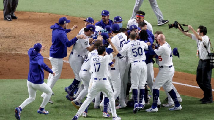 ARLINGTON, TEXAS - OCTOBER 27: The Los Angeles Dodgers celebrate after defeating the Tampa Bay Rays 3-1 in Game Six to win the 2020 MLB World Series at Globe Life Field on October 27, 2020 in Arlington, Texas. (Photo by Sean M. Haffey/Getty Images)