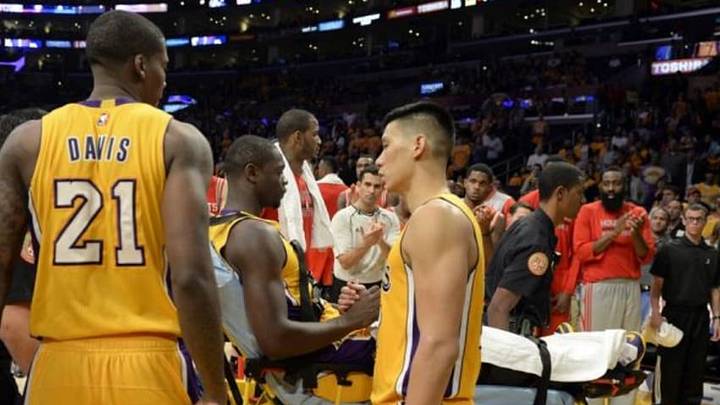 Oct 28, 2014; Los Angeles, CA, USA; Los Angeles Lakers forward Julius Randle (30) shakes hands with guard Jeremy Lin (17) after an injury during the second half against the Houston Rockets at Staples Center. Mandatory Credit: Richard Mackson-USA TODAY Sports