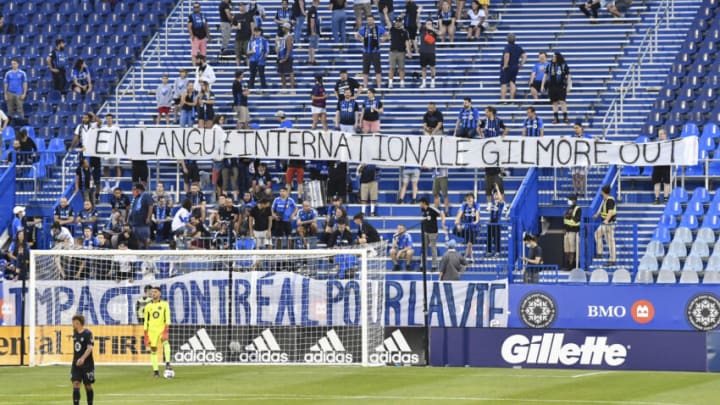 MONTREAL, QC - JULY 17: Superfans Ultras Montreal, raise a banner in the first half calling for the firing of President and CEO of CF Montreal Kevin Gilmore during the MLS game against FC Cincinnati at Saputo Stadium on July 17, 2021 in Montreal, Quebec, Canada. CF Montreal defeated FC Cincinnati 5-4. (Photo by Minas Panagiotakis/Getty Images)