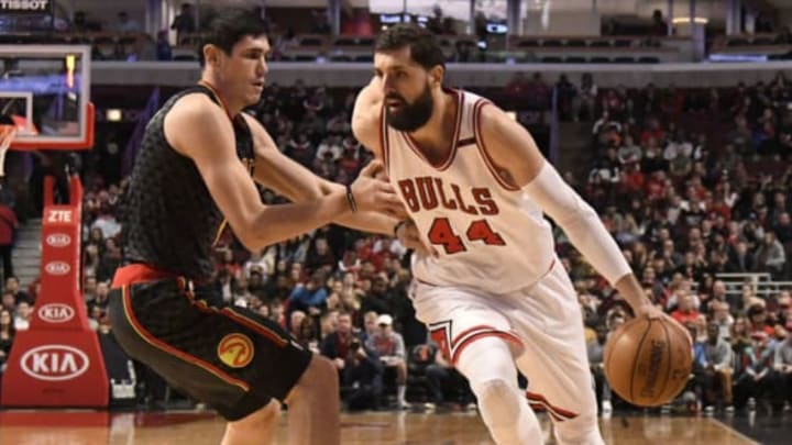 Apr 1, 2017; Chicago, IL, USA; Chicago Bulls forward Nikola Mirotic (44) is defended by Atlanta Hawks forward Ersan Ilyasova (7) during the first quarter at the United Center. Mandatory Credit: David Banks-USA TODAY Sports