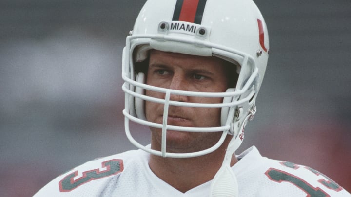 Gino Torretta #13, Quarterback for the University of Miami Hurricanes during the NCAA Southwest Conference college football game on 31st August 1991 at the Razorback Stadium in Fayetteville, Arkansas, United States. The Hurricanes won the game 31 – 3. (Photo by “nTom Ewart/Allsport/Getty Images)