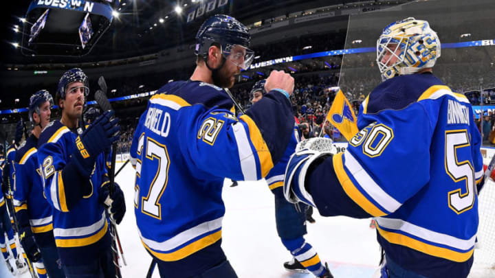 ST. LOUIS, MO - NOVEMBER 19: Alex Pietrangelo #27 of the St. Louis Blues and Jordan Binnington #50 of the St. Louis Blues celebrate their victory over the Tampa Bay Lightning at Enterprise Center on November 19, 2019 in St. Louis, Missouri. (Photo by Scott Rovak/NHLI via Getty Images)