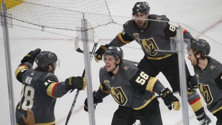 LAS VEGAS, NV - APRIL 13: Erik Haula #56 celebrates after scoring the game winning goal with his teammates James Neal #18, Alex Tuch #89 and Jon Merrill #15 of the Vegas Golden Knights against the Los Angeles Kings in Game Two of the Western Conference First Round during the 2018 NHL Stanley Cup Playoffs at T-Mobile Arena on April 13, 2018 in Las Vegas, Nevada. (Photo by Jeff Speer/NHLI via Getty Images)