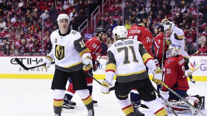 WASHINGTON, DC - FEBRUARY 04: Reilly Smith #19 of the Vegas Golden Knights celebrates with William Karlsson #71 after scoring a second period goal against the Washington Capitals at Capital One Arena on February 4, 2018 in Washington, DC. (Photo by Patrick McDermott/NHLI via Getty Images)