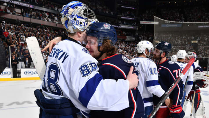 COLUMBUS, OH - APRIL 16: Artemi Panarin #9 of the Columbus Blue Jackets hugs goaltender Andrei Vasilevskiy #88 of the Tampa Bay Lightning following Game Four of the Eastern Conference First Round during the 2019 NHL Stanley Cup Playoffs on April 16, 2019 at Nationwide Arena in Columbus, Ohio. Columbus defeated Tampa Bay 7-3 to win the series 4-0. (Photo by Jamie Sabau/NHLI via Getty Images)