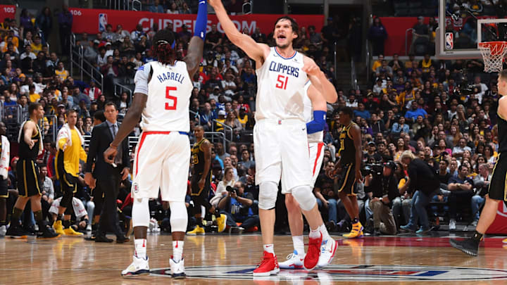 LOS ANGELES, CA – APRIL 11: Montrezl Harrell #5 and Boban Marjanovic #51 of the LA Clippers react to a play during the game against the Los Angeles Lakers on April 11, 2018 at STAPLES Center in Los Angeles, California. NOTE TO USER: User expressly acknowledges and agrees that, by downloading and/or using this photograph, user is consenting to the terms and conditions of the Getty Images License Agreement. Mandatory Copyright Notice: Copyright 2018 NBAE (Photo by Adam Pantozzi/NBAE via Getty Images)