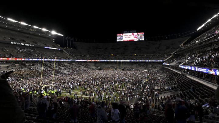 Nov 26, 2022; College Station, Texas, USA; Fans rush the field after a game between the Texas A&M Aggies and the LSU Tigers at Kyle Field. Mandatory Credit: Maria Lysaker-USA TODAY Sports