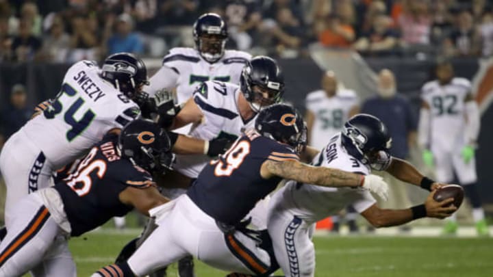 CHICAGO, IL – SEPTEMBER 17: Quarterback Russell Wilson #3 of the Seattle Seahawks is tackled by Aaron Lynch #99 of the Chicago Bears in the first quarter at Soldier Field on September 17, 2018 in Chicago, Illinois. (Photo by Jonathan Daniel/Getty Images)