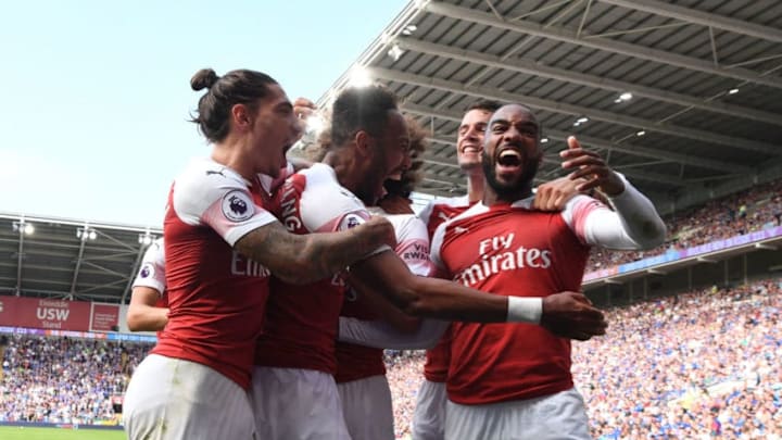 CARDIFF, WALES - SEPTEMBER 02: (2ndL) Pierre-Emerick Aubameyang celebrates the 2nd goal with (L) Hector Bellerin and (R) Alex Lacazette during the Premier League match between Cardiff City and Arsenal at Cardiff City Stadium on September 2, 2018 in Cardiff, United Kingdom. (Photo by Stuart MacFarlane/Arsenal FC via Getty Images)