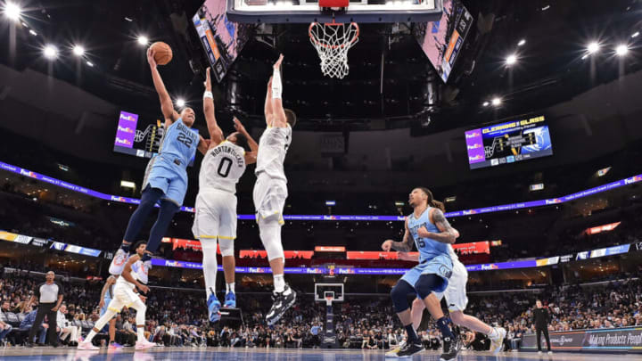 MEMPHIS, TENNESSEE - FEBRUARY 15: Desmond Bane #22 of the Memphis Grizzlies shoots over Talen Horton-Tucker #0 of the Utah Jazz during the game at FedExForum on February 15, 2023 in Memphis, Tennessee. NOTE TO USER: User expressly acknowledges and agrees that, by downloading and or using this photograph, User is consenting to the terms and conditions of the Getty Images License Agreement. (Photo by Justin Ford/Getty Images)