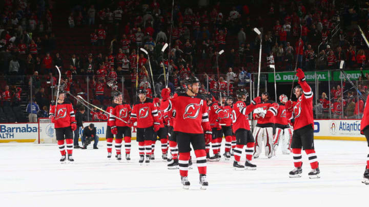 NEWARK, NJ - OCTOBER 17: The New Jersey Devils salute their fans after defeating theTampa Bay Lightning in a shootout at Prudential Center on October 17, 2017 in Newark, New Jersey. The Devils defeated the Lightning 5-4. (Photo by Andy Marlin/NHLI via Getty Images)
