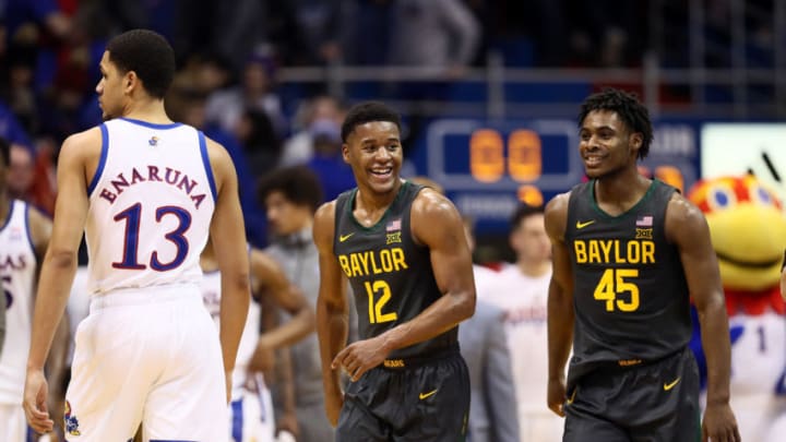 LAWRENCE, KANSAS - JANUARY 11: Jared Butler #12 and Davion Mitchell #45 of the Baylor Bears smile as Baylor defeats the Kansas Jayhawks to win the game at Allen Fieldhouse on January 11, 2020 in Lawrence, Kansas. (Photo by Jamie Squire/Getty Images)