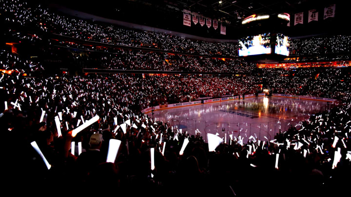 WASHINGTON, DC – JUNE 04: Fans wave their lights prior to Game Four of the 2018 NHL Stanley Cup Final between the Washington Capitals and the Vegas Golden Knights at Capital One Arena on June 4, 2018 in Washington, DC. (Photo by Avi Gerver/Getty Images)