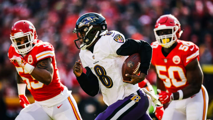 KANSAS CITY, MO – DECEMBER 9: Lamar Jackson #8 of the Baltimore Ravens runs out of the pocket with Anthony Hitchens #53 and teammate Justin Houston #50 of the Kansas City Chiefs in pursuit during the second quarter of the game at Arrowhead Stadium on December 9, 2018 in Kansas City, Missouri. (Photo by David Eulitt/Getty Images)