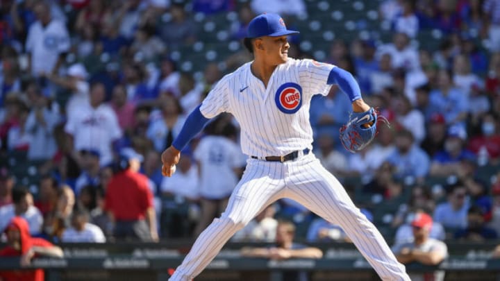 CHICAGO, ILLINOIS - SEPTEMBER 26: Adbert Alzolay #73 of the Chicago Cubs pitches in the fourth inning against the St. Louis Cardinals at Wrigley Field on September 26, 2021 in Chicago, Illinois. (Photo by Quinn Harris/Getty Images)