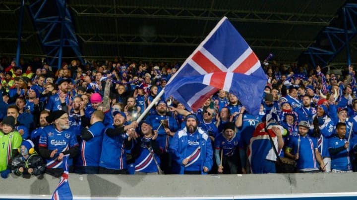 Iceland's fans celebrates at the FIFA World Cup 2018 qualification football match between Iceland and Kosovo in Reykjavik, Iceland on October 9, 2017.Iceland qualified for the FIFA World Cup 2018 as smallest country ever after beating Kosovo 2-0 at home in Reykjavik. / AFP PHOTO / Haraldur Gudjonsson / ALTERNATIVE CROP (Photo credit should read HARALDUR GUDJONSSON/AFP/Getty Images)