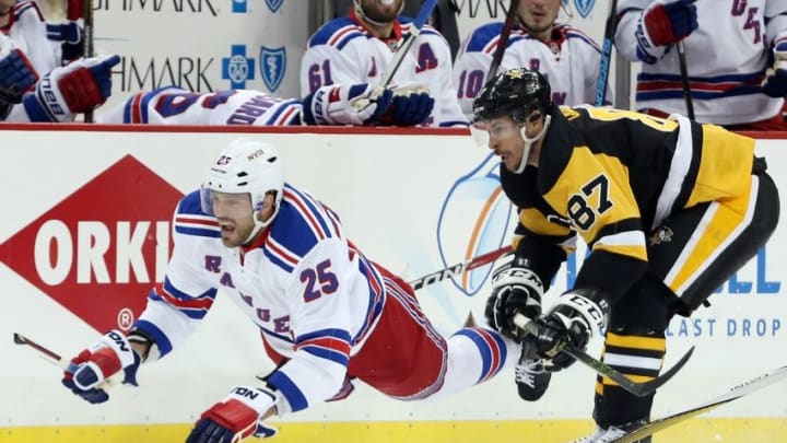 Apr 16, 2016; Pittsburgh, PA, USA; Pittsburgh Penguins center Sidney Crosby (87) commits a slashing penalty against New York Rangers left wing Viktor Stalberg (25) during the third period in game two of the first round of the 2016 Stanley Cup Playoffs at the CONSOL Energy Center. The Rangers won 4-2. Mandatory Credit: Charles LeClaire-USA TODAY Sports