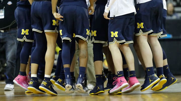 KANSAS CITY, MO - MARCH 23: The Michigan Wolverines huddle prior to the 2017 NCAA Men's Basketball Tournament Midwest Regional against the Oregon Ducks at Sprint Center on March 23, 2017 in Kansas City, Missouri. (Photo by Jamie Squire/Getty Images)