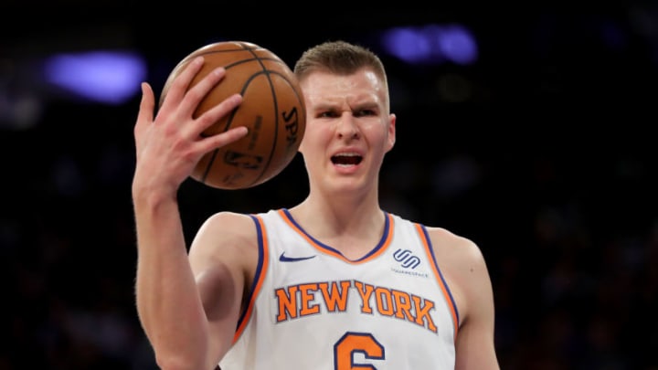 NEW YORK, NY - DECEMBER 21: Kristaps Porzingis #6 of the New York Knicks reacts in the third quarter against the Boston Celtics during their game at Madison Square Garden on December 21, 2017 in New York City. NOTE TO USER: User expressly acknowledges and agrees that, by downloading and or using this photograph, User is consenting to the terms and conditions of the Getty Images License Agreement. (Photo by Abbie Parr/Getty Images)
