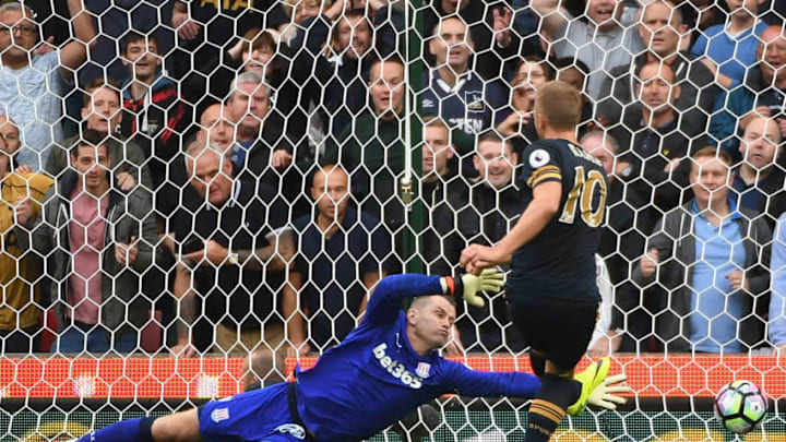 STOKE ON TRENT, ENGLAND - SEPTEMBER 10: Harry Kane of Tottenham Hotspur scores his sides first goal past Shay Given of Stoke City during the Premier League match between Stoke City and Tottenham Hotspur at Britannia Stadium on September 10, 2016 in Stoke on Trent, England. (Photo by Ross Kinnaird/Getty Images)