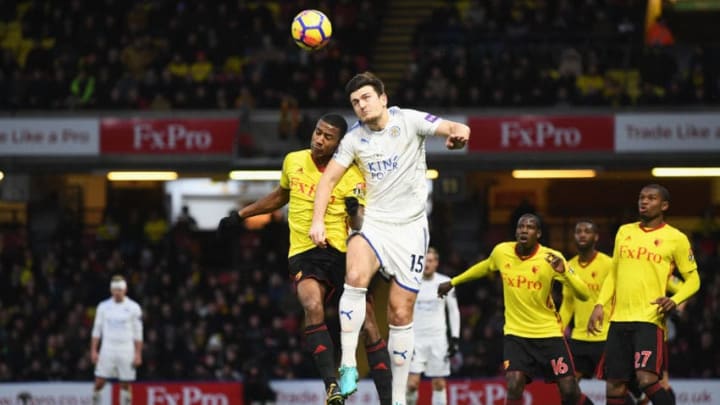 WATFORD, ENGLAND - DECEMBER 26: Harry Maguire of Leicester City jumps for a header with Marvin Zeegelaar of Watford during the Premier League match between Watford and Leicester City at Vicarage Road on December 26, 2017 in Watford, England. (Photo by Michael Regan/Getty Images)